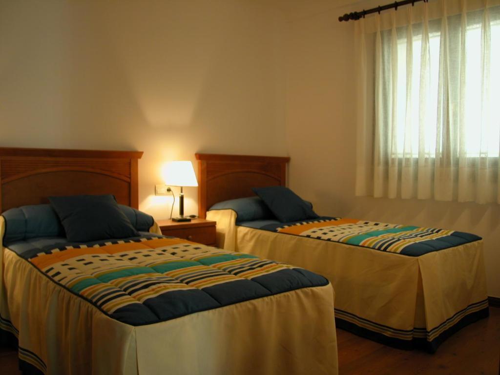 Apartamentos Estop Sahun Pokoj fotografie