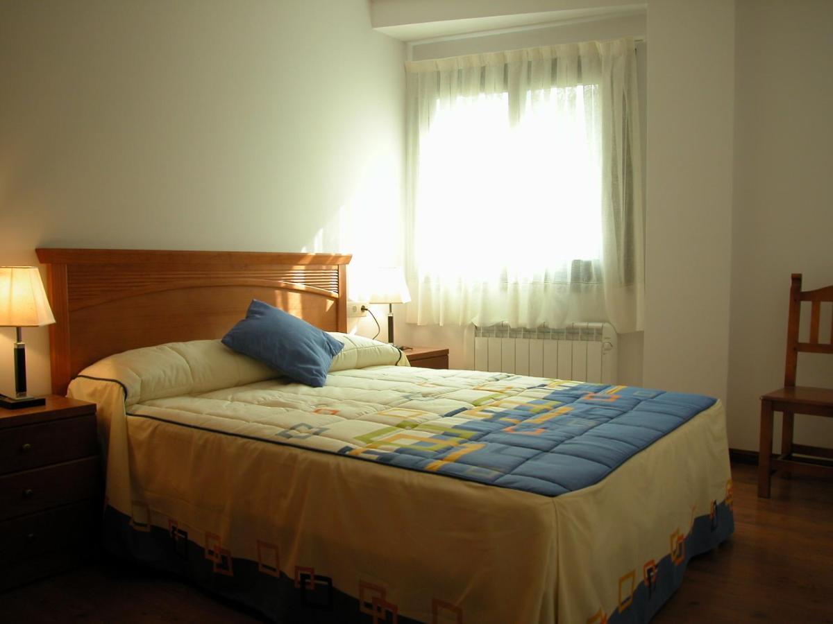 Apartamentos Estop Sahun Pokoj fotografie
